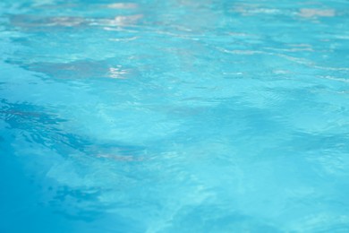 Photo of Clear water in outdoor swimming pool on sunny day