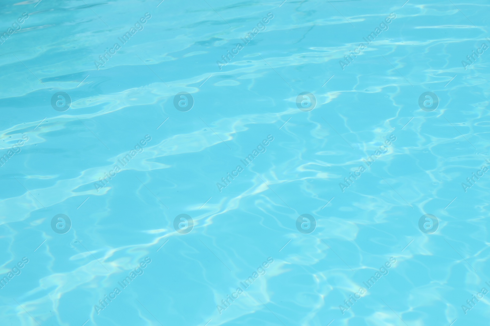 Photo of Clear water in outdoor swimming pool on sunny day