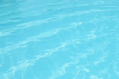 Photo of Clear water in outdoor swimming pool on sunny day