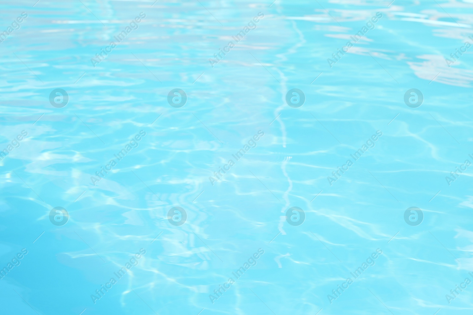 Photo of Clear water in outdoor swimming pool on sunny day