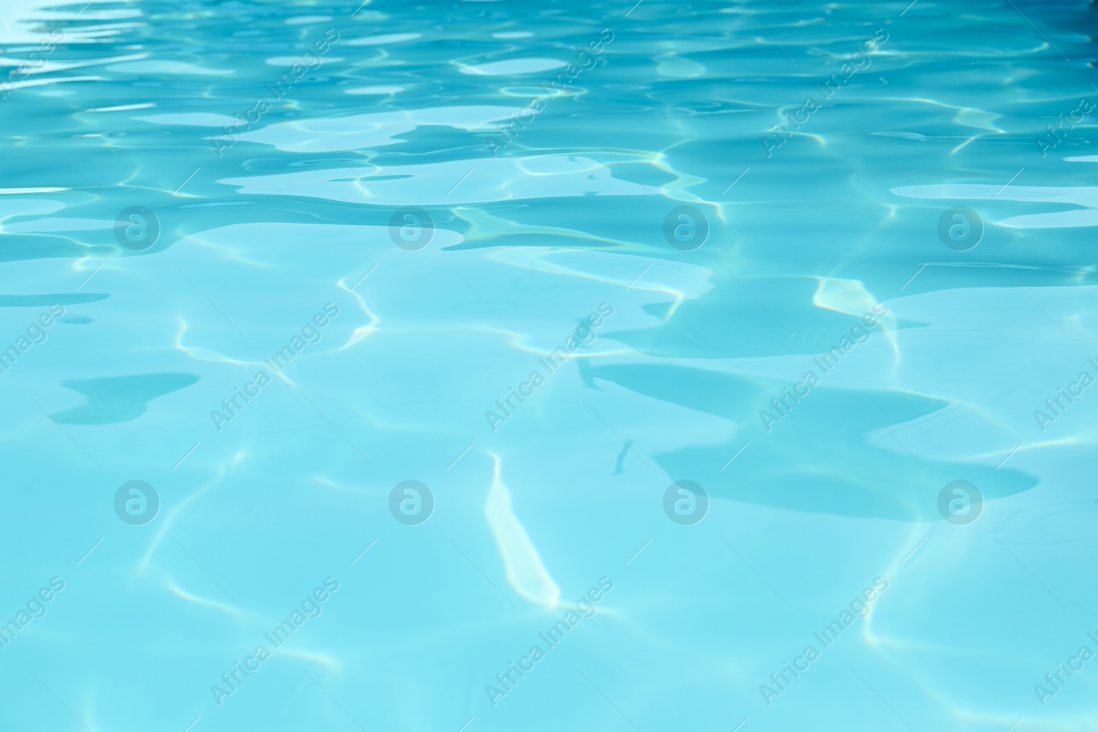 Photo of Clear water in outdoor swimming pool on sunny day