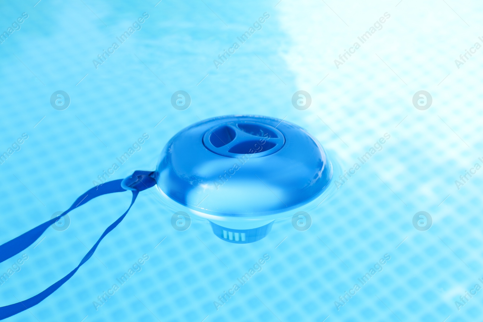 Photo of One robotic cleaner in swimming pool outdoors