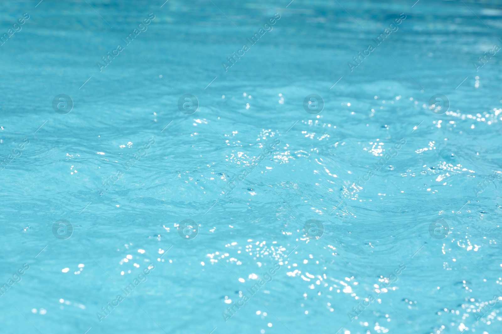 Photo of Clear water in outdoor swimming pool on sunny day