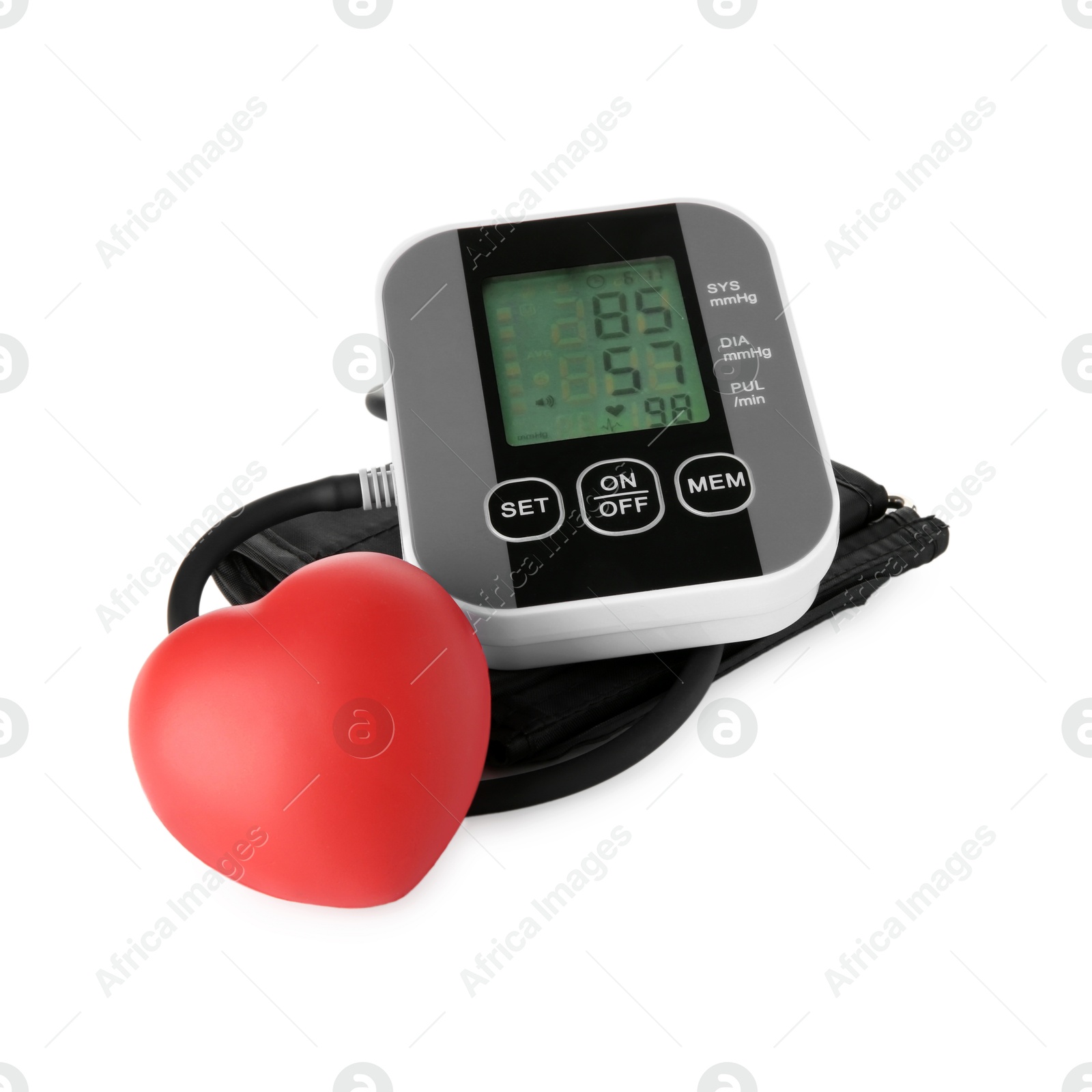 Photo of Blood pressure measuring device and red heart figure isolated on white