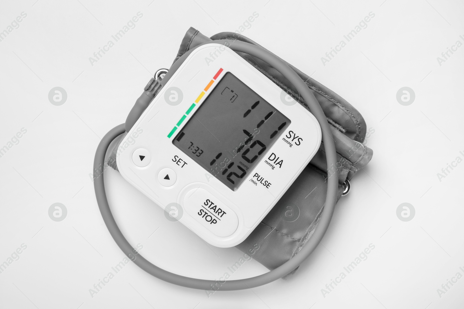 Photo of Blood pressure measuring device on light grey background, top view