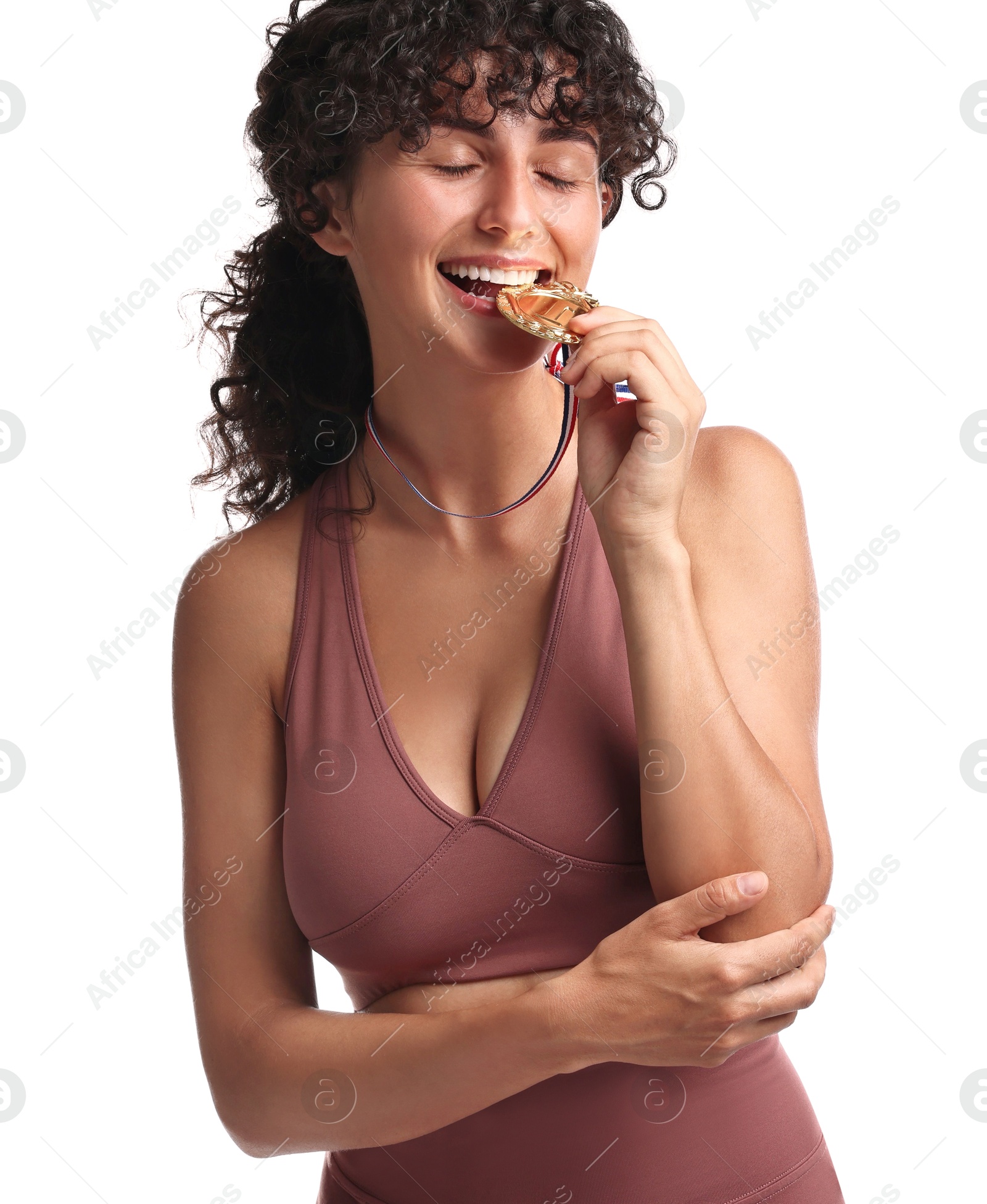 Photo of Happy winner with golden medal on white background