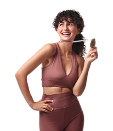 Photo of Happy winner with golden medal on white background