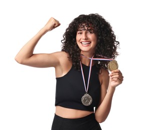 Photo of Happy winner with different medals showing muscles on white background