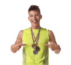 Photo of Happy winner pointing at his different medals on white background