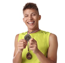 Photo of Happy winner with different medals on white background