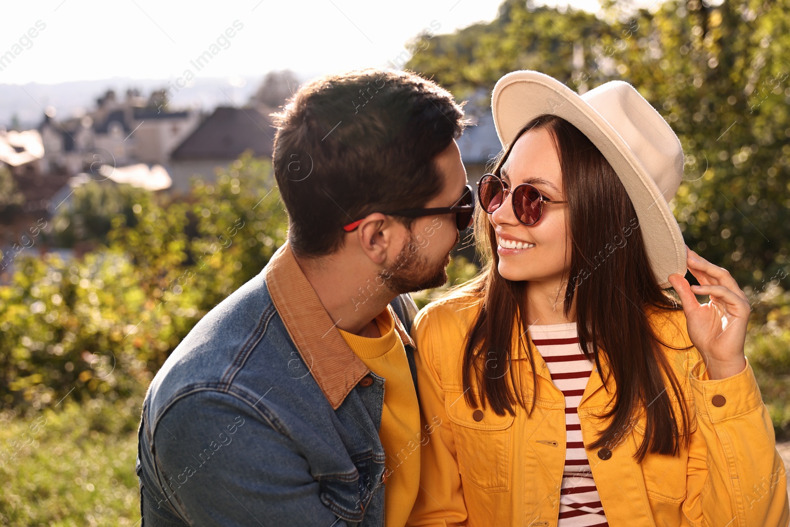 Photo of Beautiful couple in sunglasses outdoors on autumn day