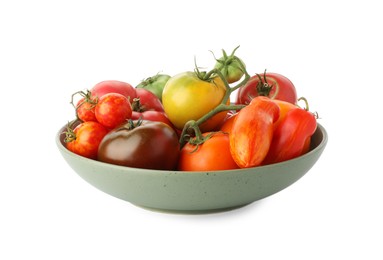 Photo of Different ripe tomatoes in bowl isolated on white