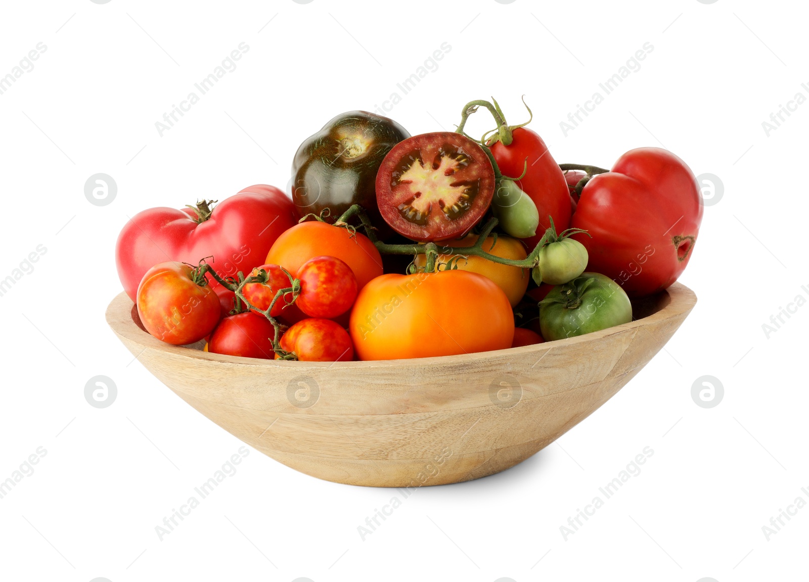 Photo of Different ripe tomatoes in bowl isolated on white