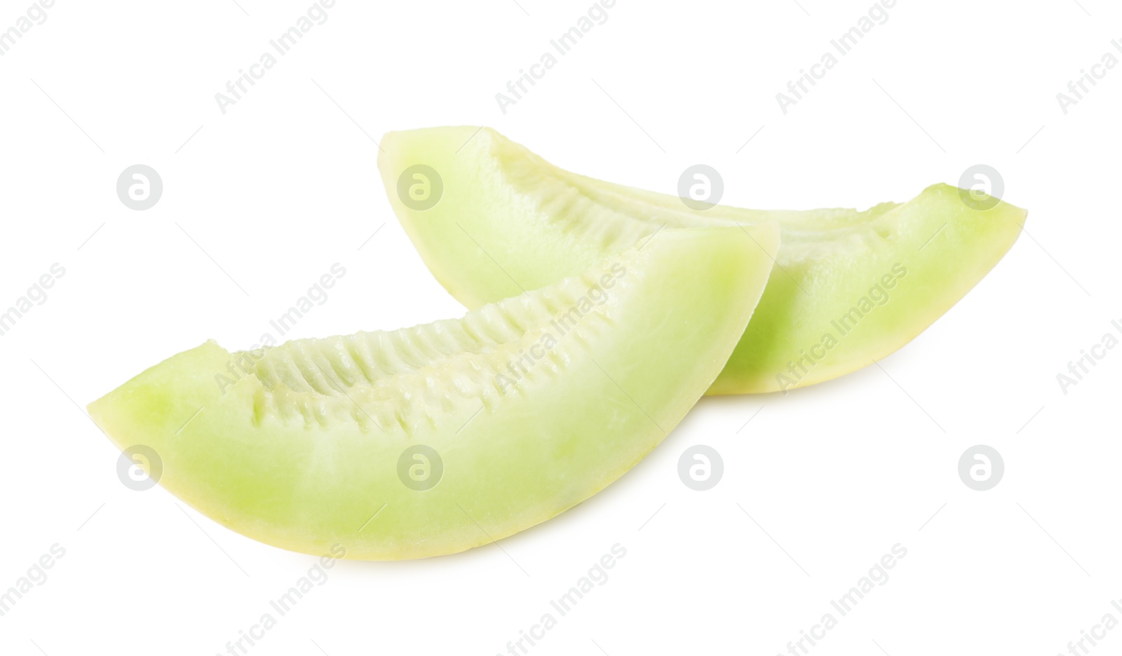 Photo of Slices of fresh honeydew melon isolated on white