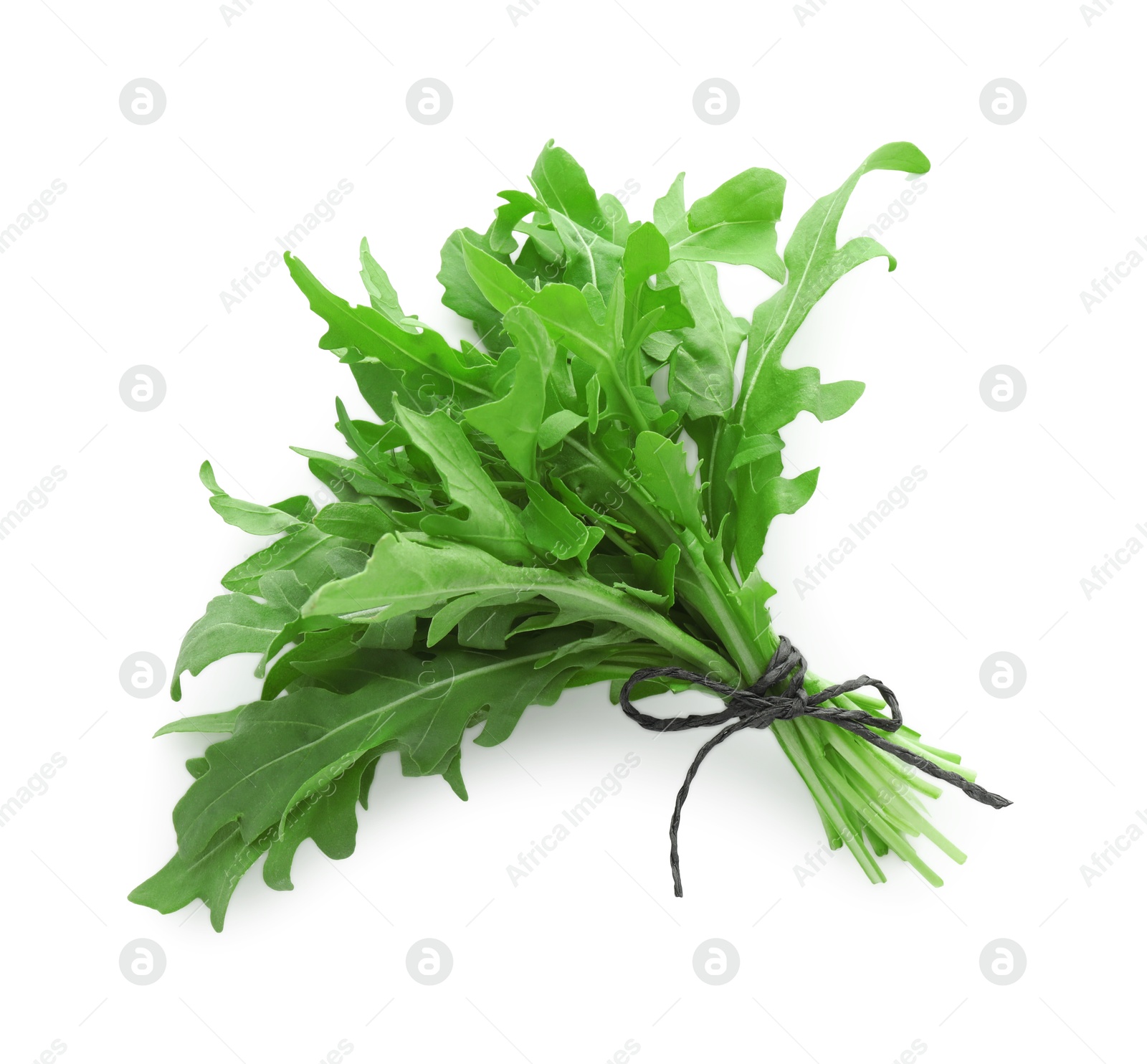 Photo of Bunch of fresh arugula leaves isolated on white, top view