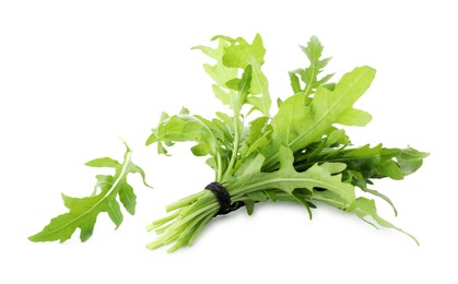 Photo of Bunch of fresh arugula leaves isolated on white