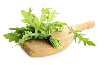 Photo of Bunch of fresh arugula leaves and board isolated on white