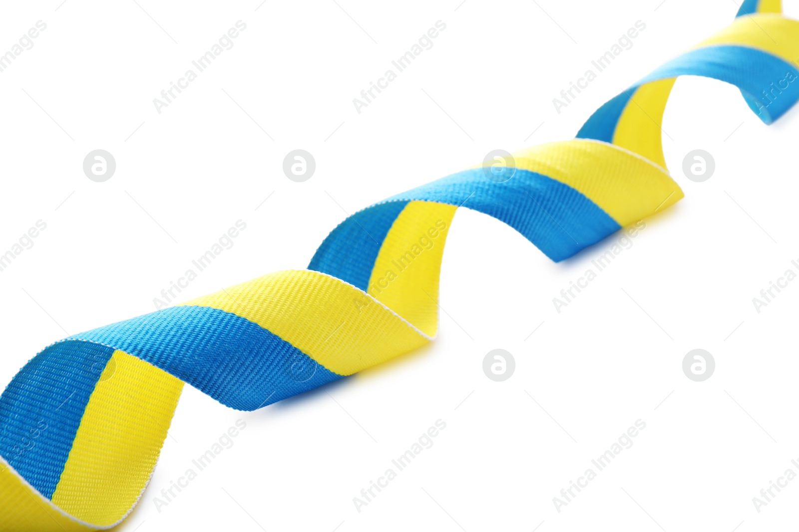 Photo of Ribbon in colors of Ukrainian national flag isolated on white