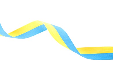 Photo of Ribbon in colors of Ukrainian national flag isolated on white, top view