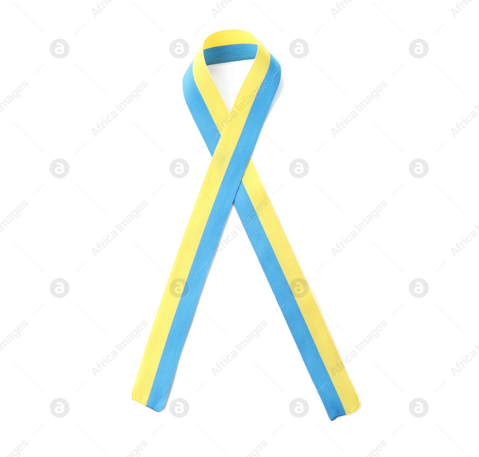 Photo of Ribbon in colors of Ukrainian national flag isolated on white, top view