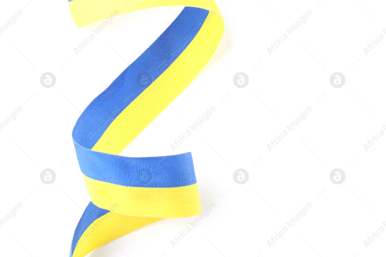 Photo of Ribbon in colors of Ukrainian national flag isolated on white