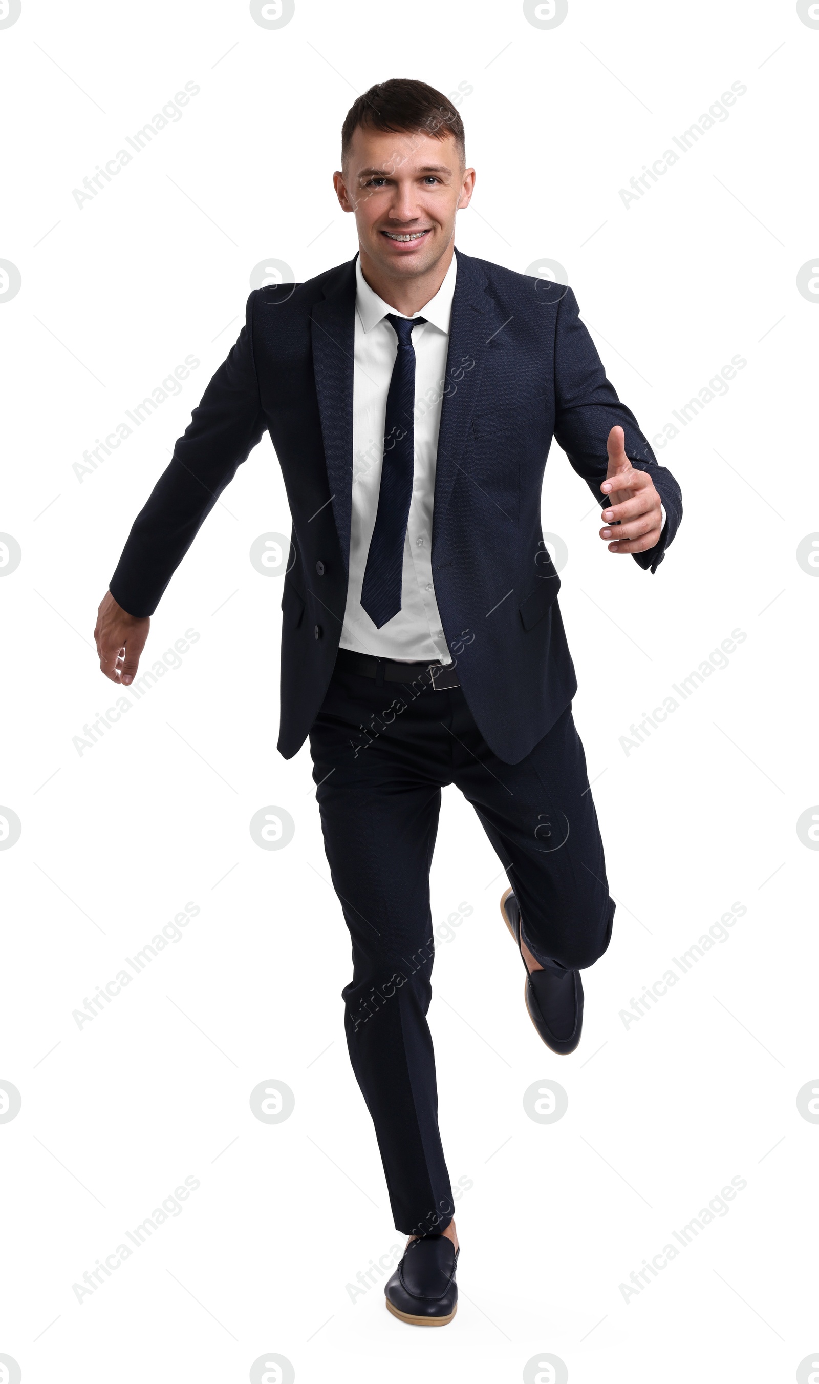 Photo of Businessman in suit running on white background