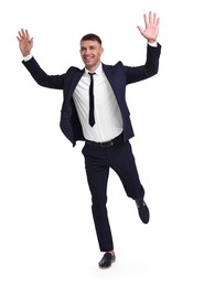 Businessman in suit running on white background