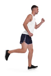 Man in sportswear running on white background