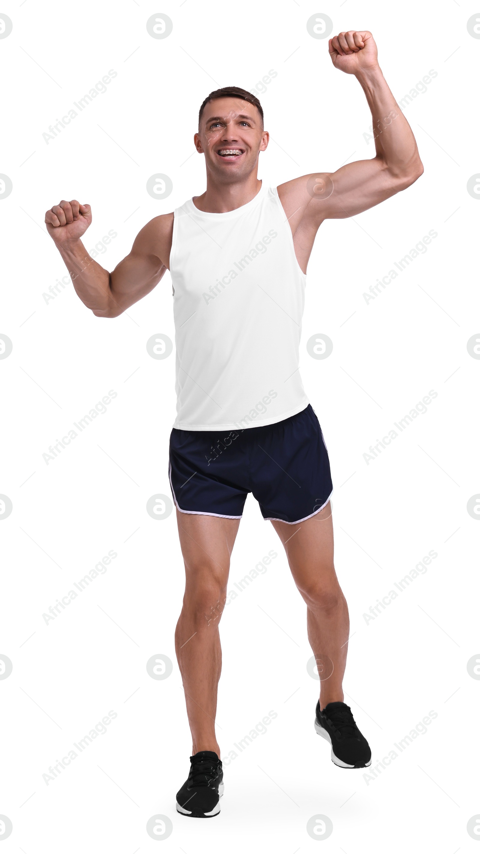 Photo of Man in sportswear running on white background