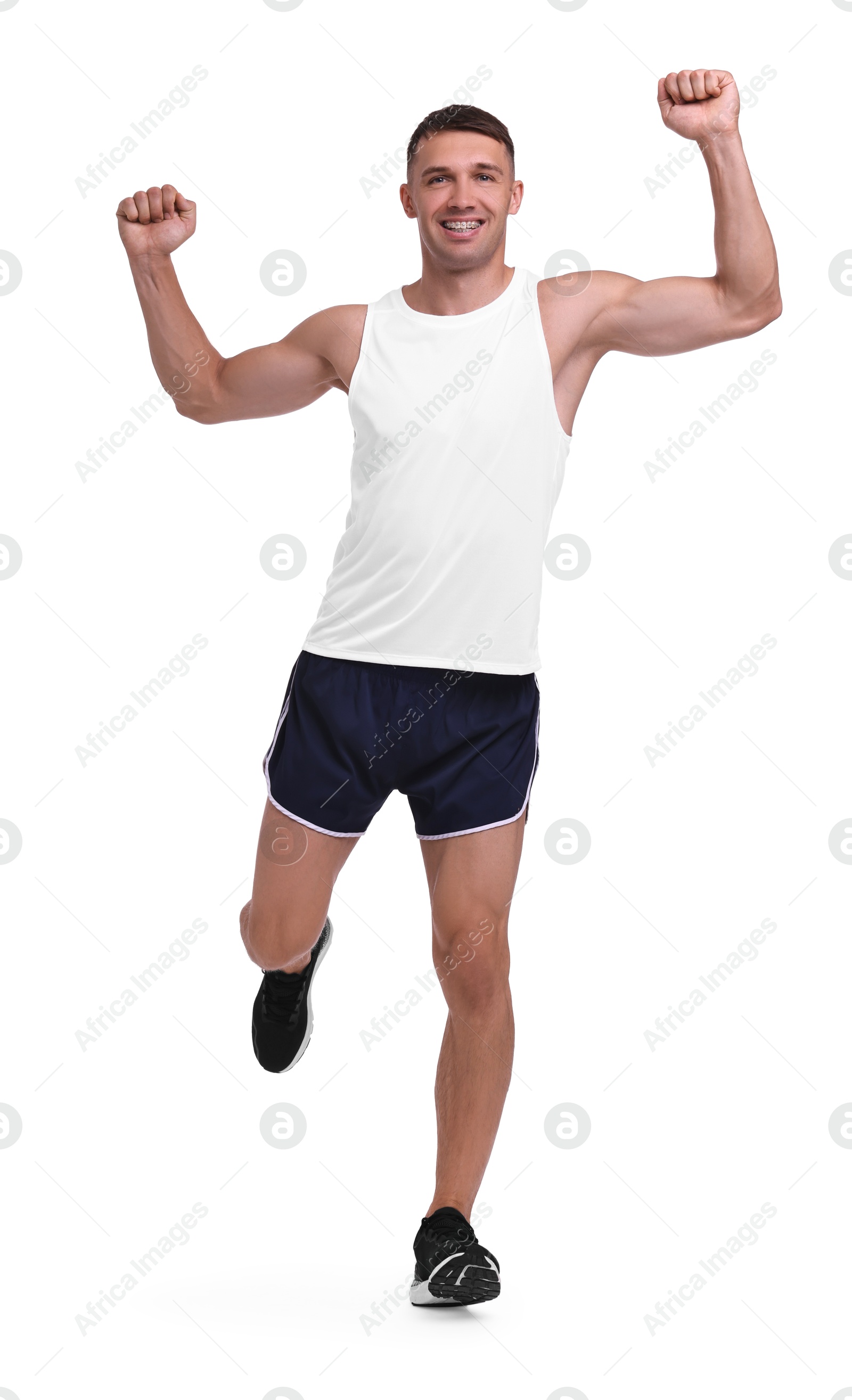 Photo of Man in sportswear running on white background