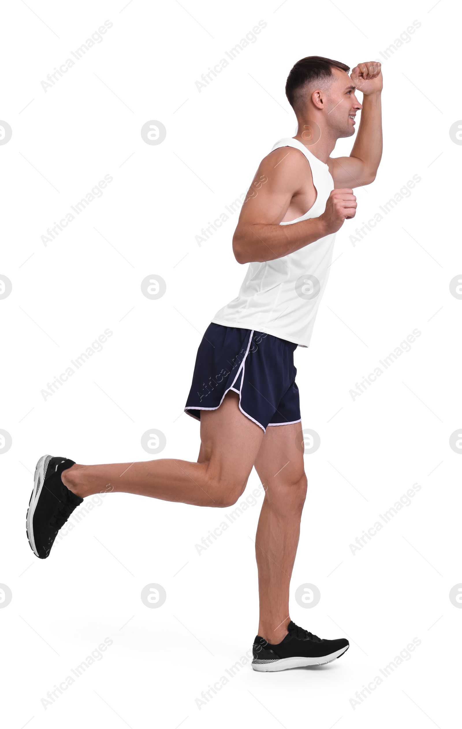 Photo of Man in sportswear running on white background