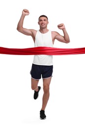 Photo of Man in sportswear crossing red finish line on white background