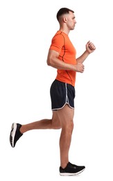 Man in sportswear running on white background