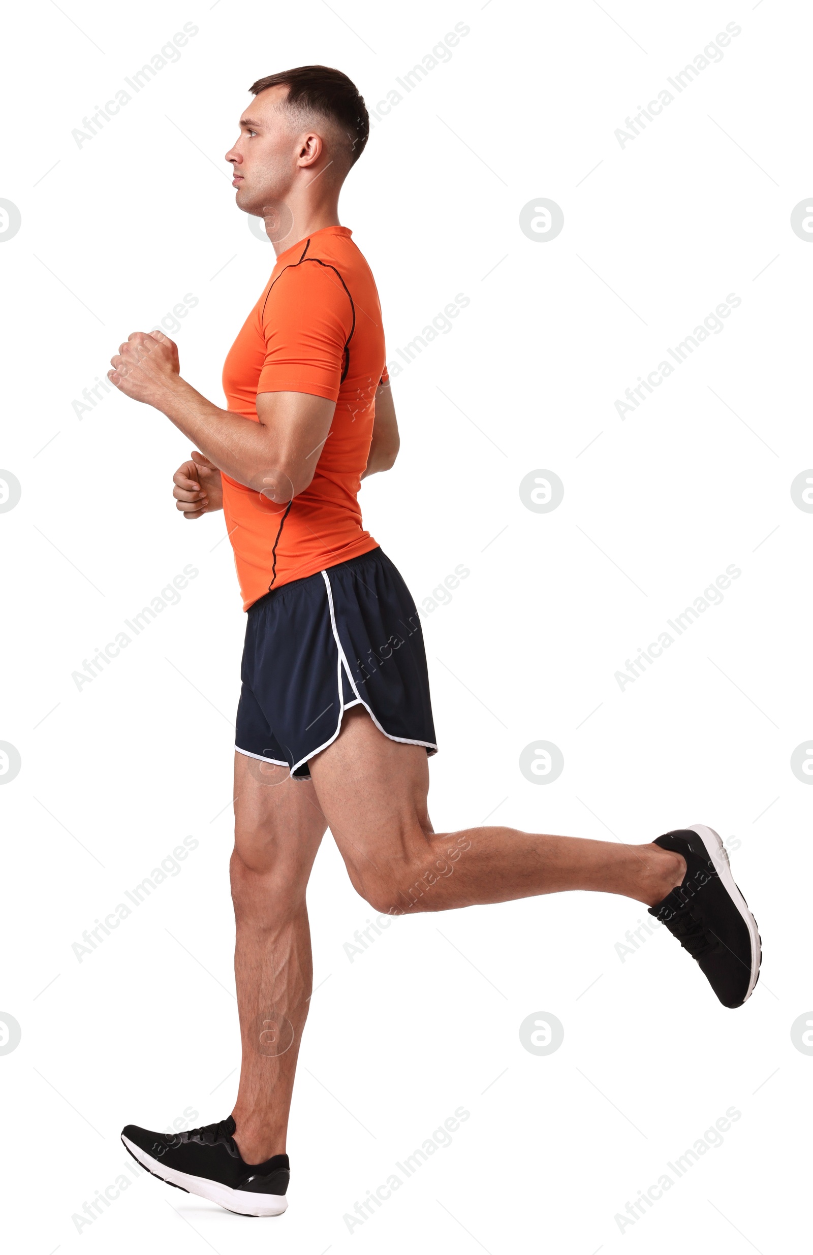 Photo of Man in sportswear running on white background