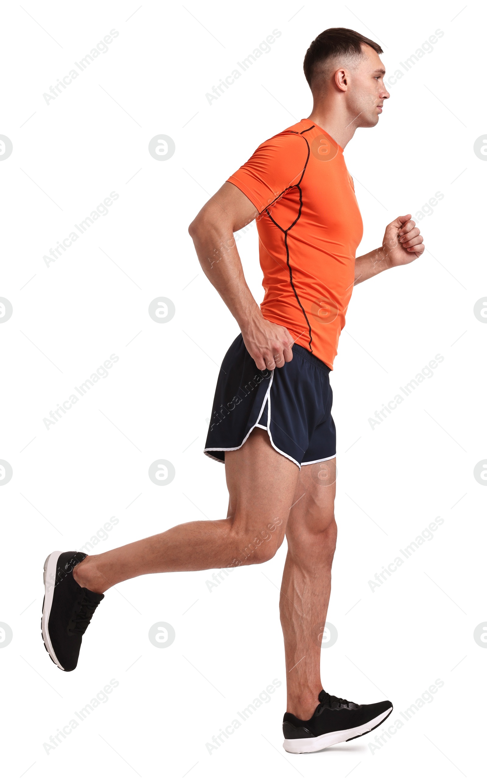 Photo of Man in sportswear running on white background