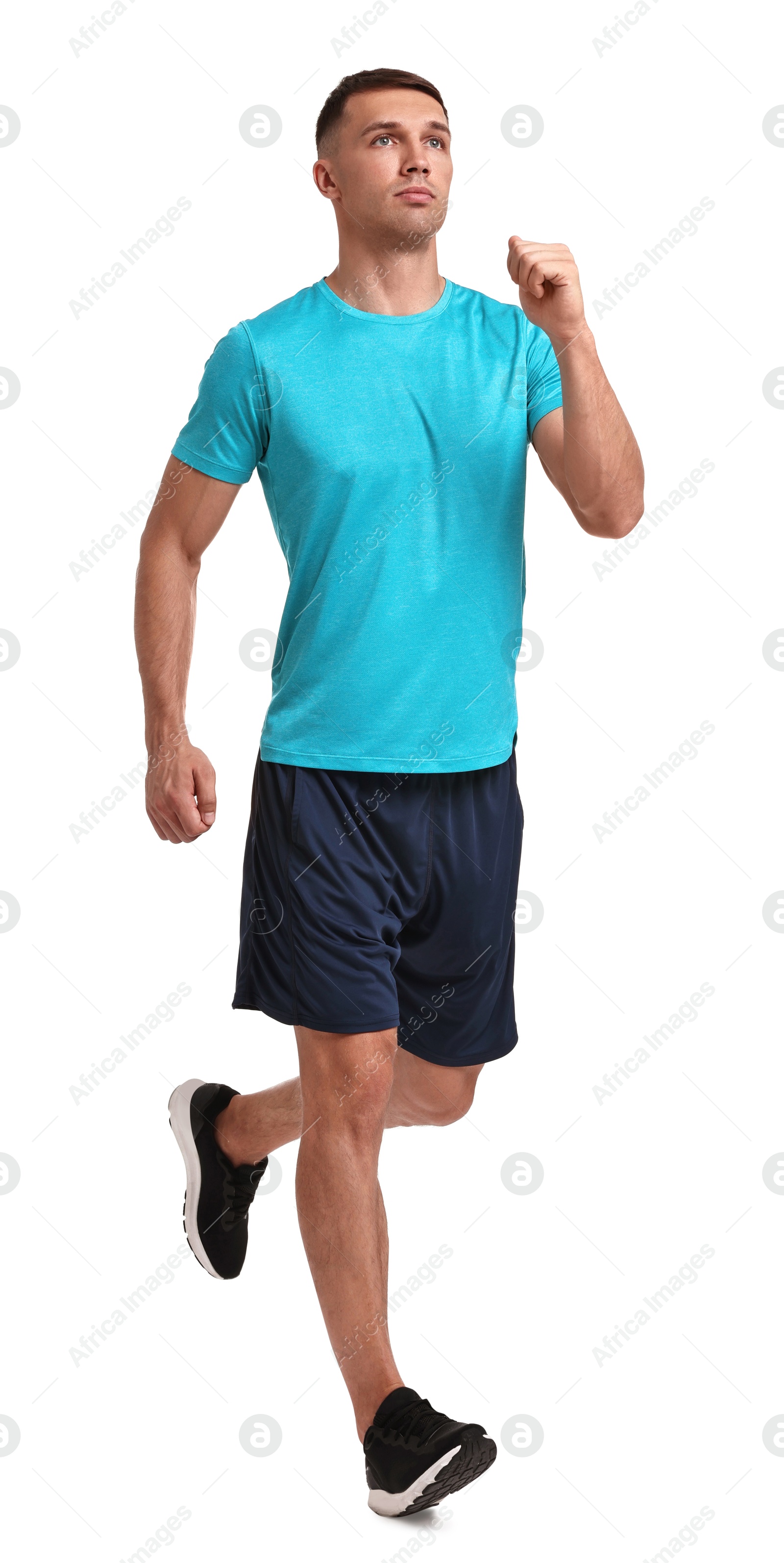 Photo of Man in sportswear running on white background