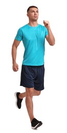 Man in sportswear running on white background