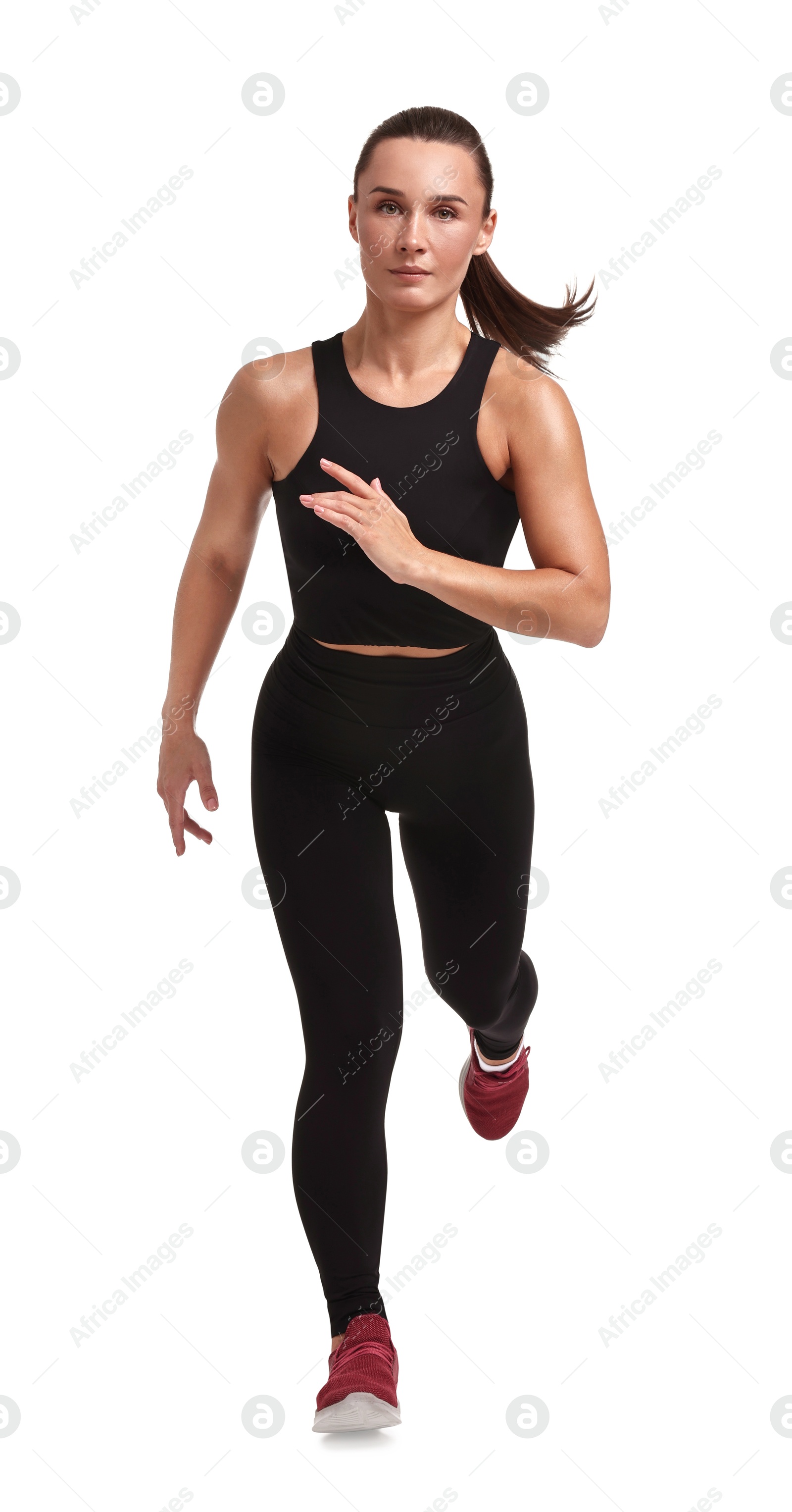 Photo of Woman in sportswear running on white background