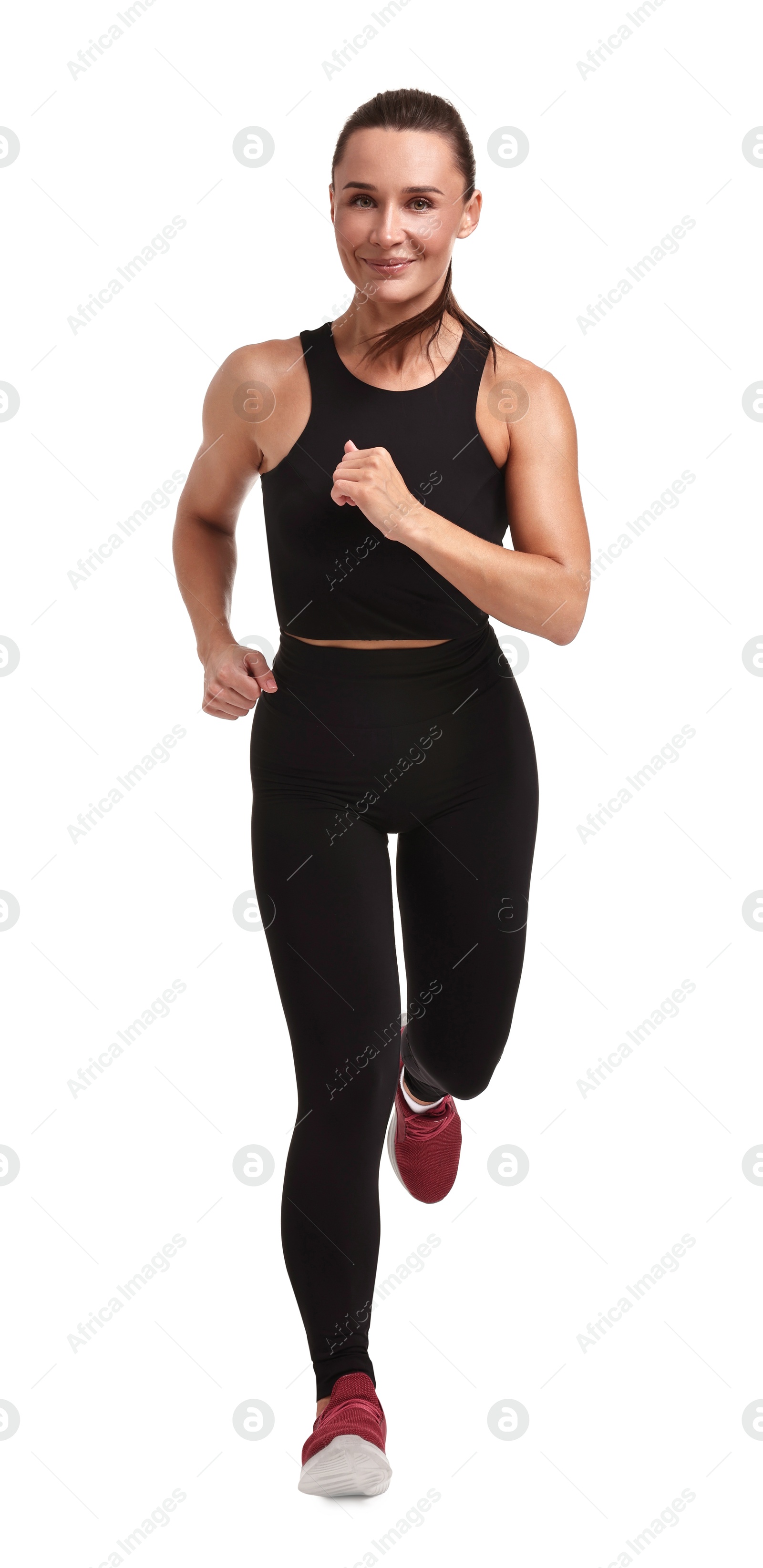 Photo of Woman in sportswear running on white background