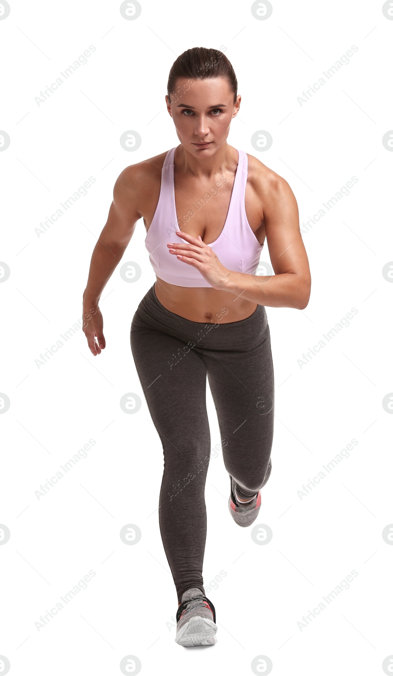 Photo of Woman in sportswear running on white background