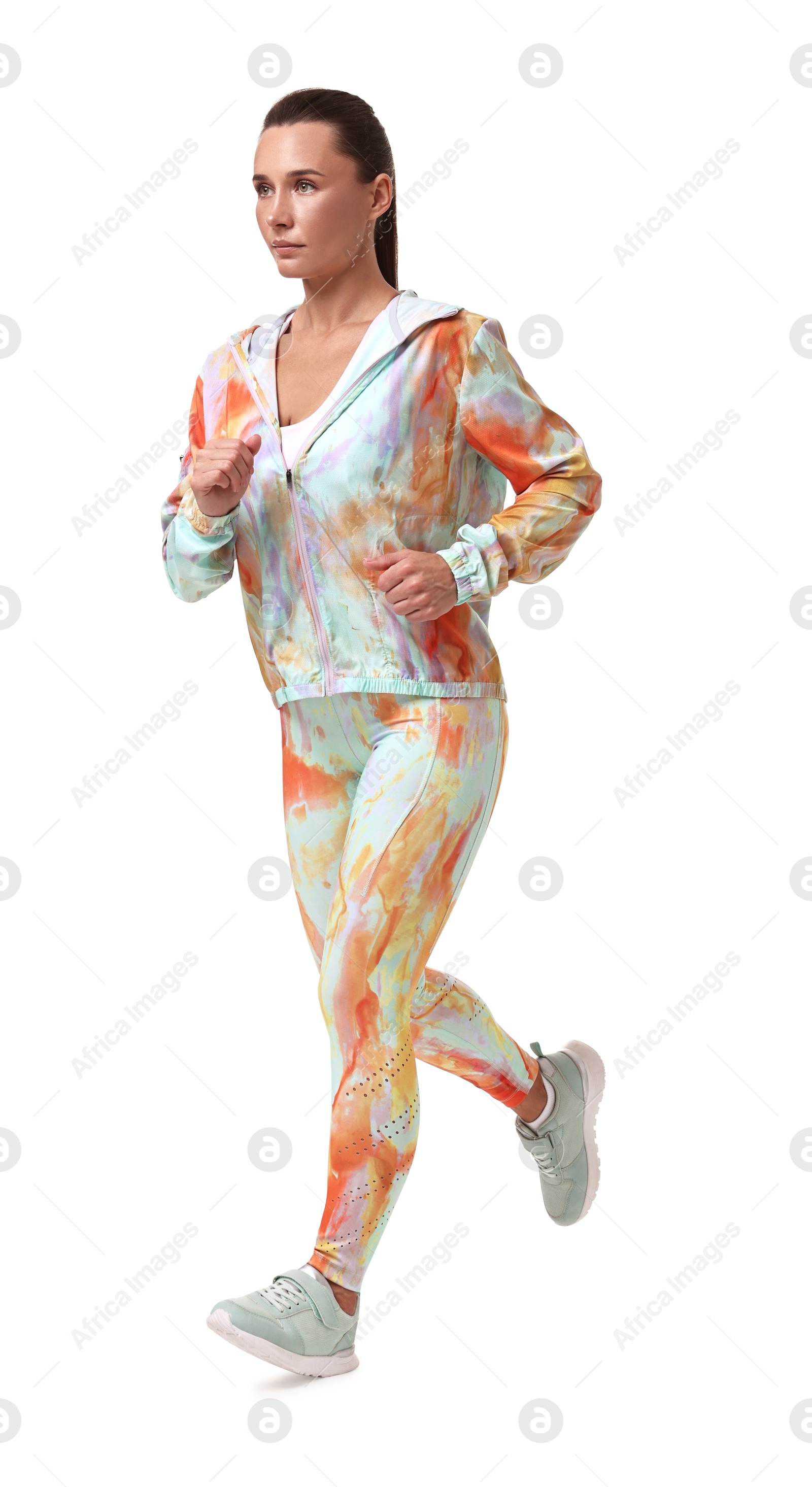 Photo of Woman in sportswear running on white background