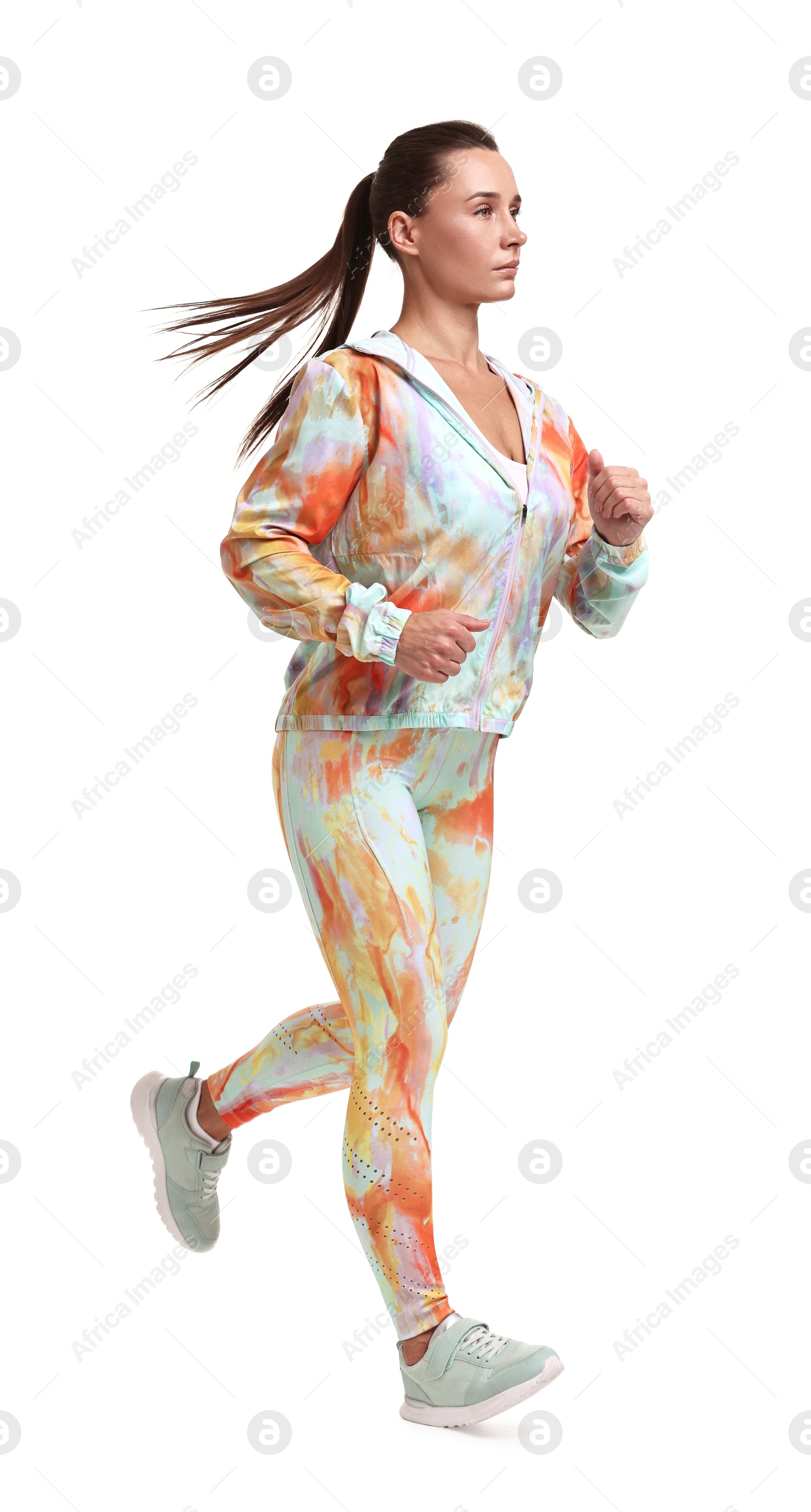 Photo of Woman in sportswear running on white background