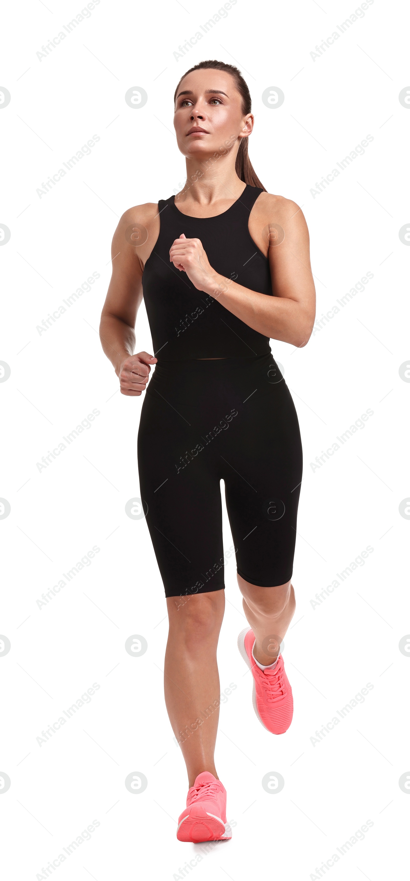 Photo of Woman in sportswear running on white background