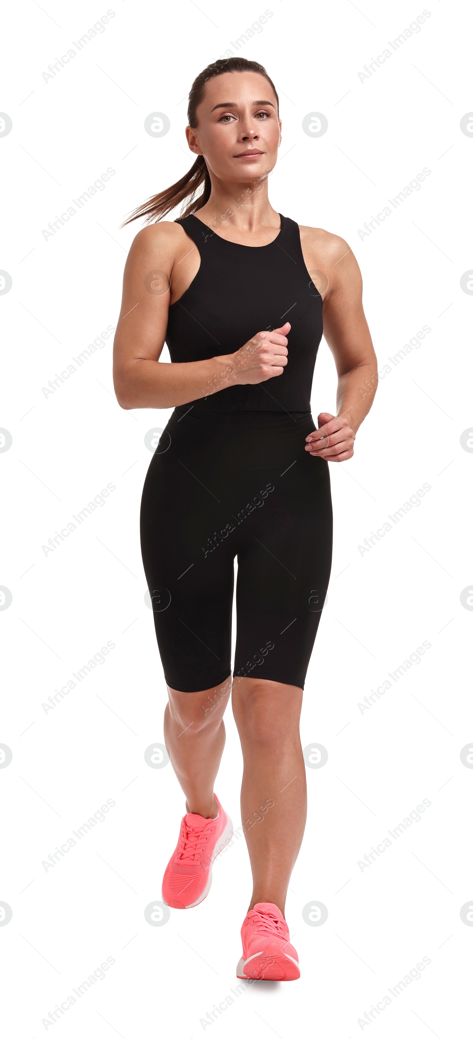 Photo of Woman in sportswear running on white background