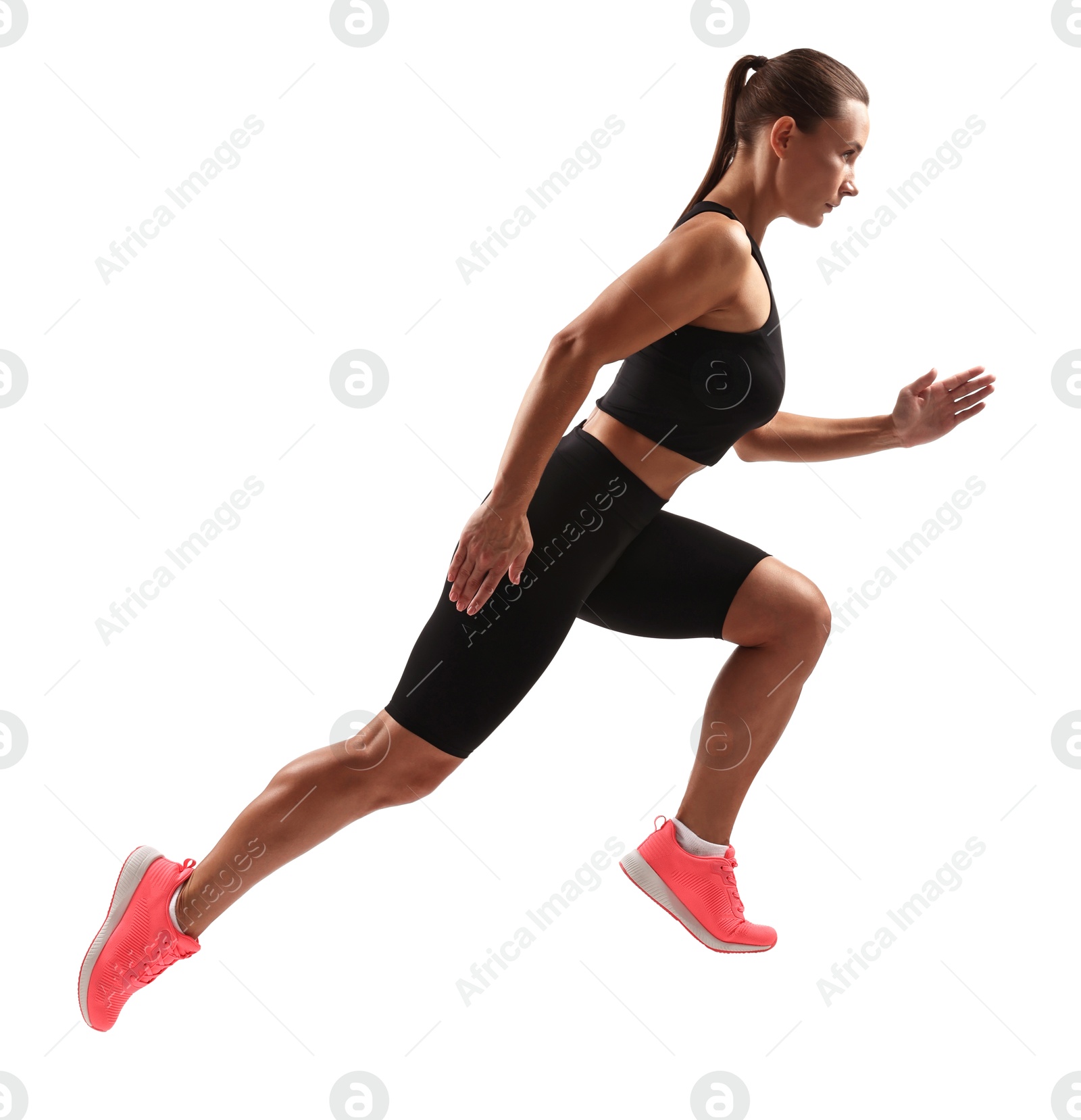 Photo of Woman in sportswear running on white background