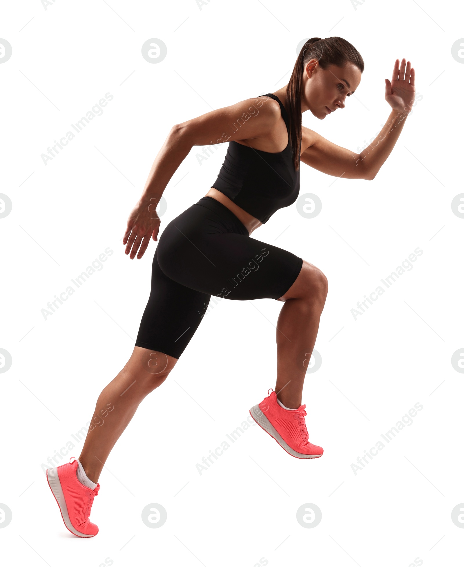 Photo of Woman in sportswear running on white background