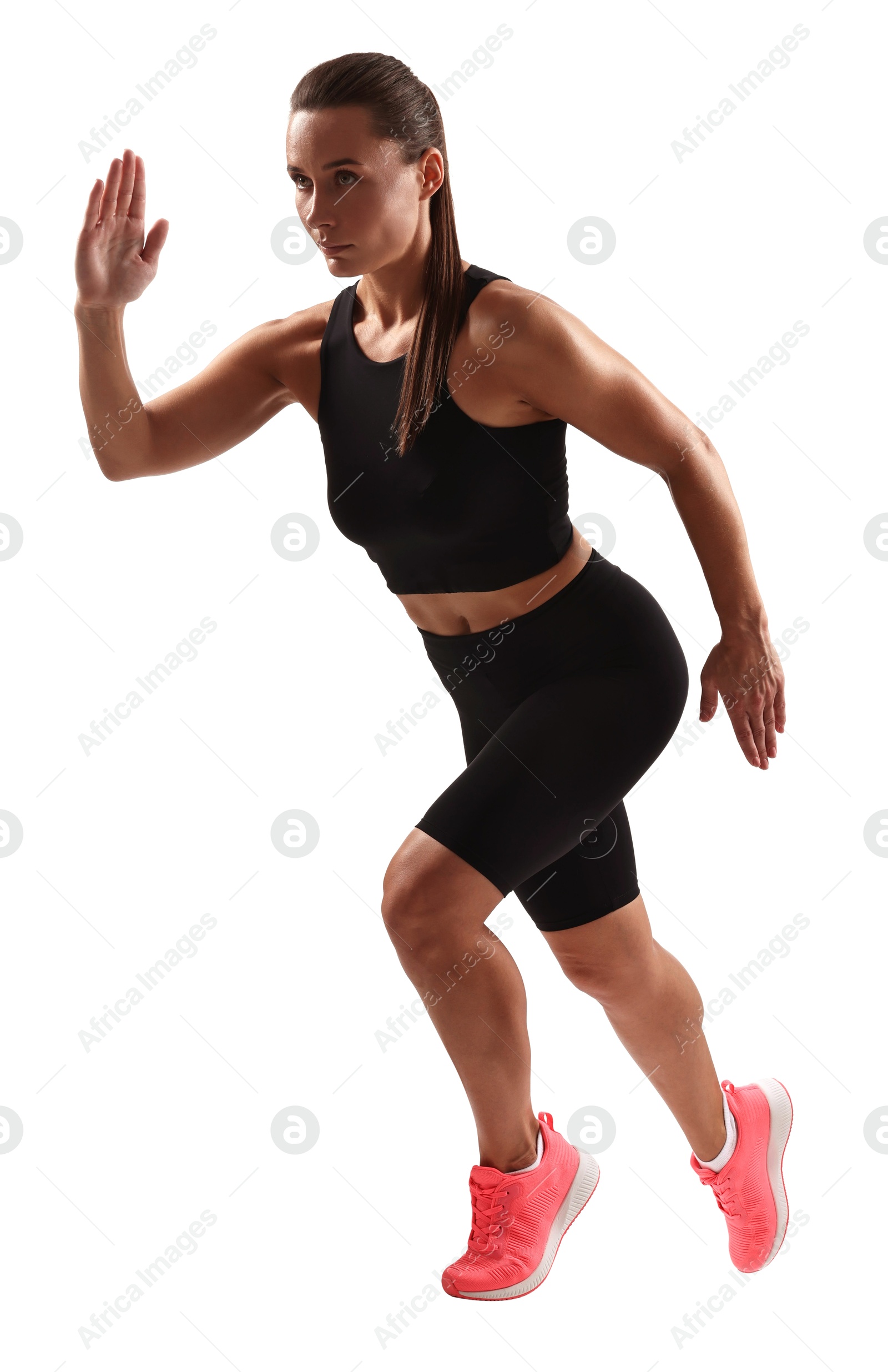 Photo of Woman in sportswear running on white background