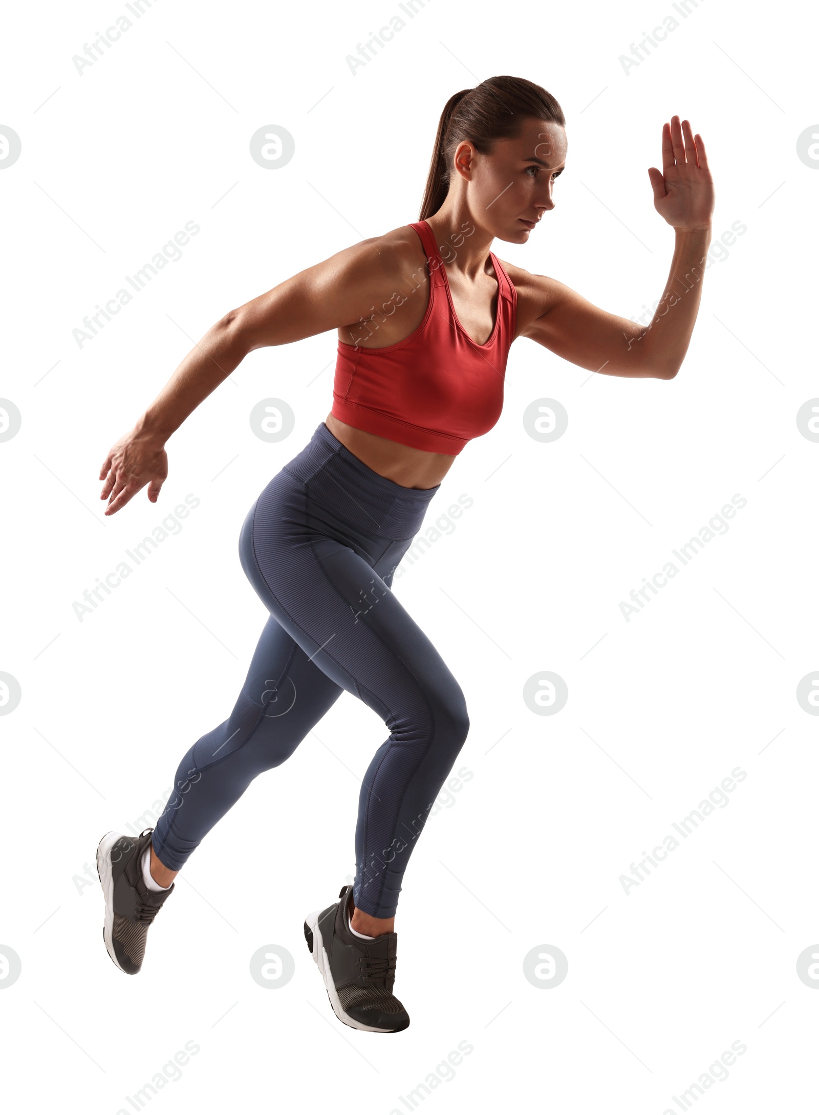 Photo of Woman in sportswear running on white background