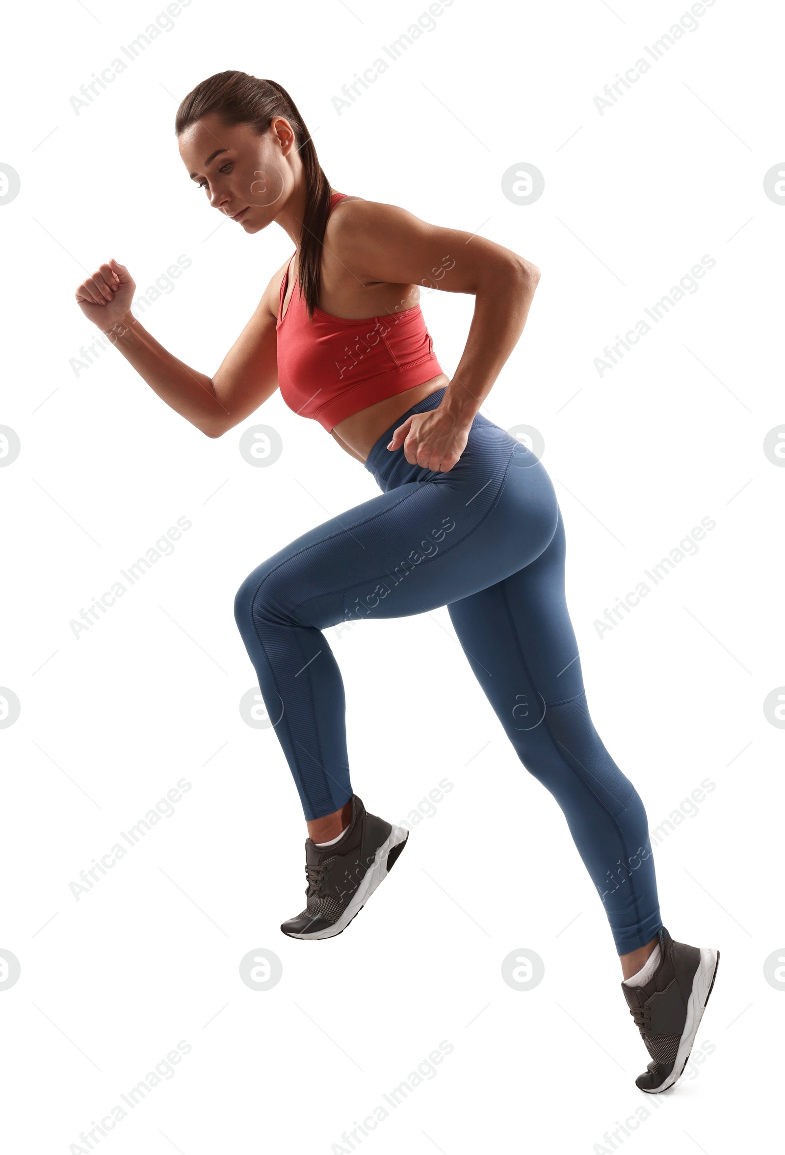 Photo of Woman in sportswear running on white background