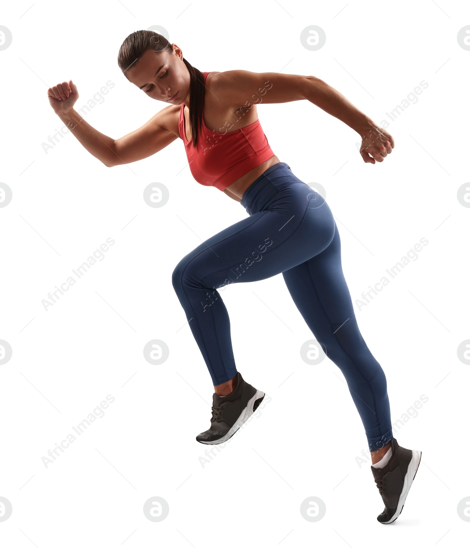 Photo of Woman in sportswear running on white background